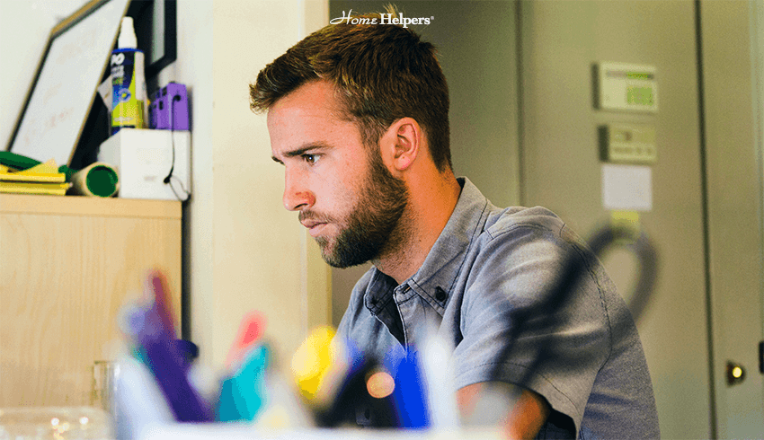 man looking at the monitor