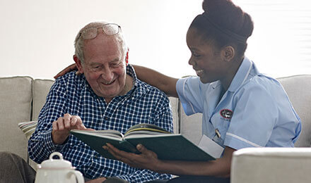 caregiver and elder man